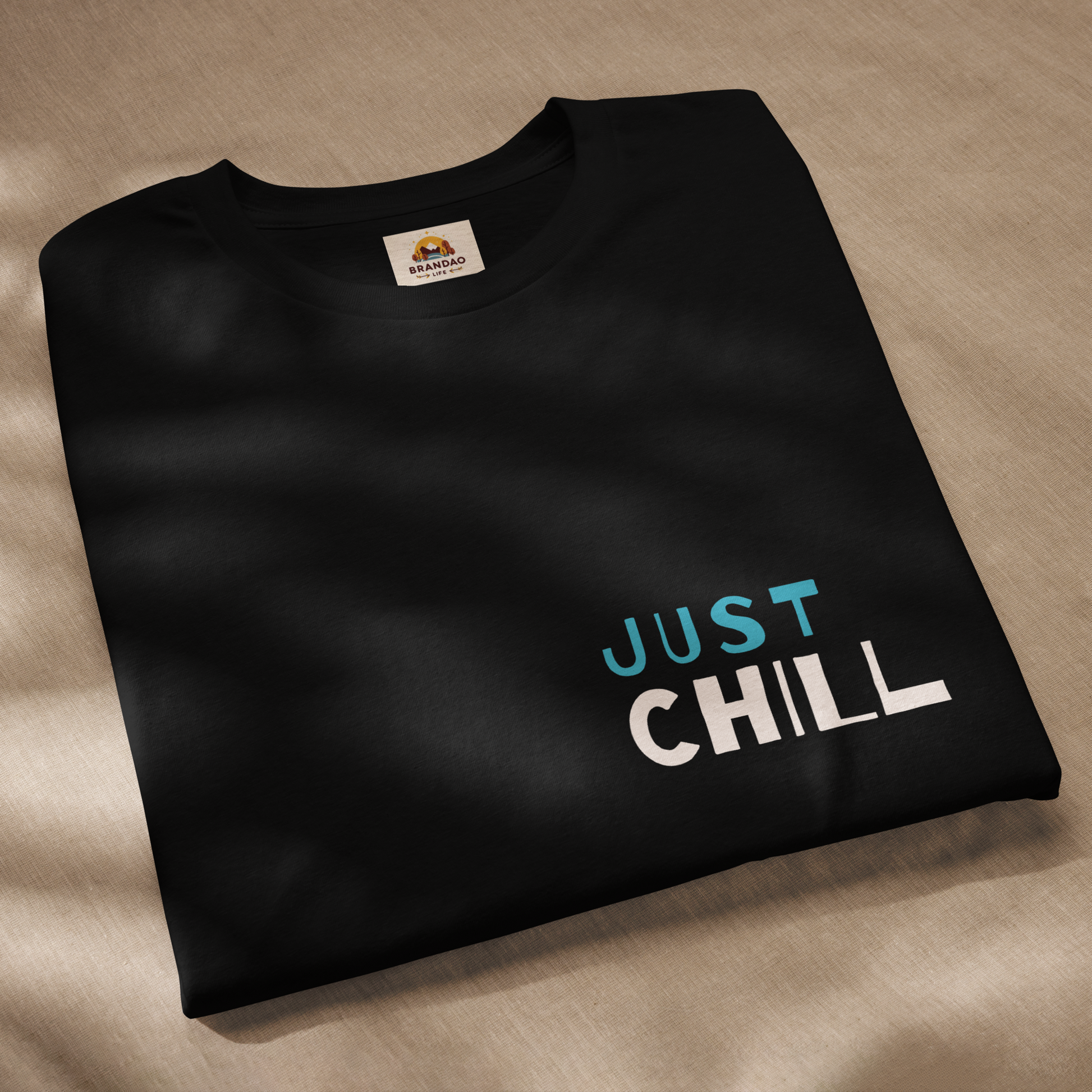 Unisex Eco-Friendly T-Shirt - Just Chill - Sustainable, Lightweight, and Perfect for Everyday Style, black ,front folded